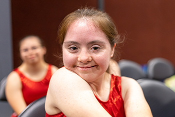 Symbolbild: Foto einer lächelnden Sportlerin der Special Olympic Games